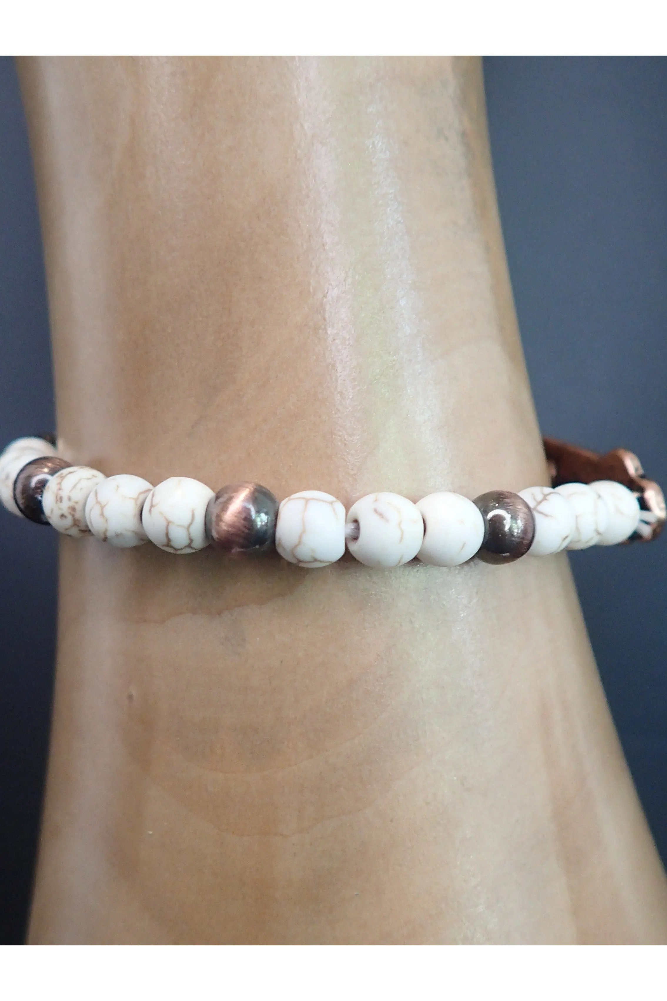 Emma Copper And White Stone Stretch Cross Bracelet