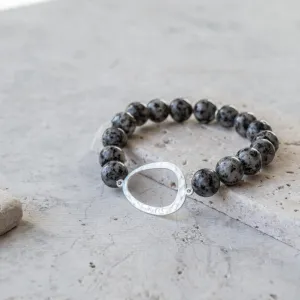 Oviod Captured Amidst Stone Beads Bracelet